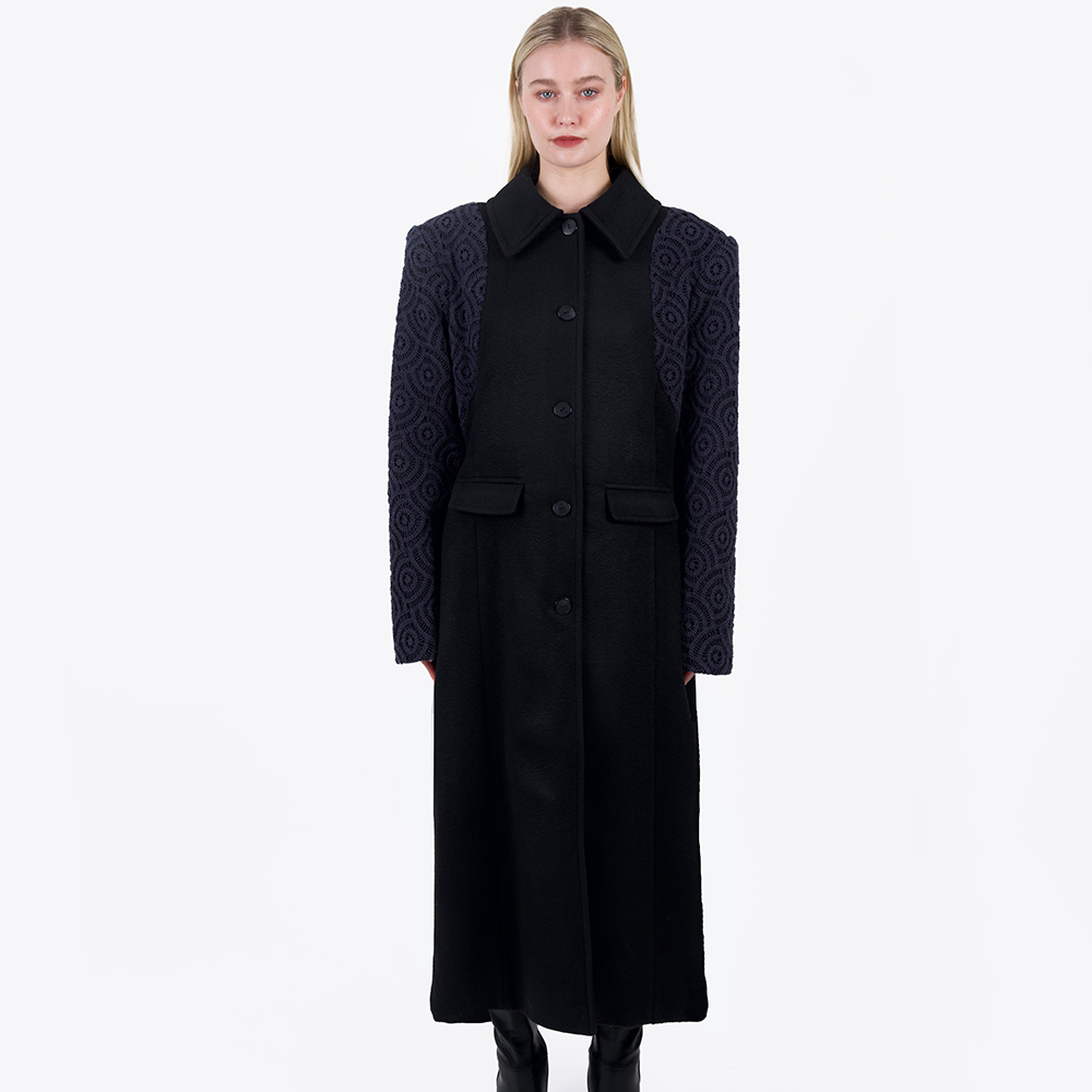 This oversized tailored coat has been made with luxury deadstock heavy weight wool with cotton crochet overlayed sleeves. 