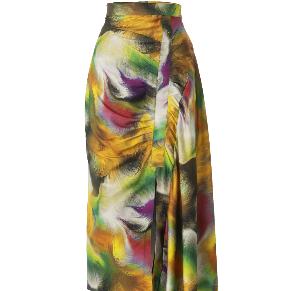 Our signature midi skirt features a side flounce detail and ruching across the body. 