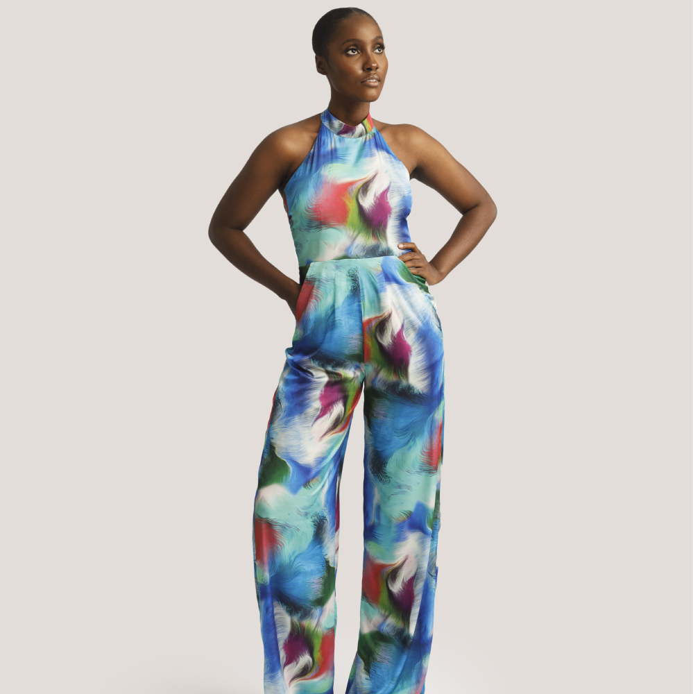 Crafted from a luxurious and lightweight silk, the Kwelaku exclusive Uloma halter jumpsuit in our custom paint splatter print