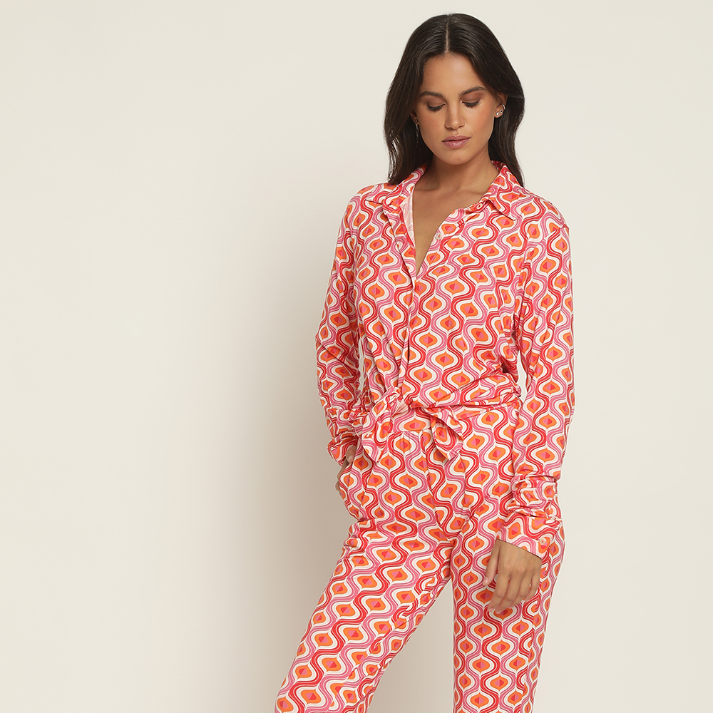 Shop our printed pink jumpsuit from our exclusive summer collection of designer outfits. Shop these wardrobe essentials for women. Shop now!