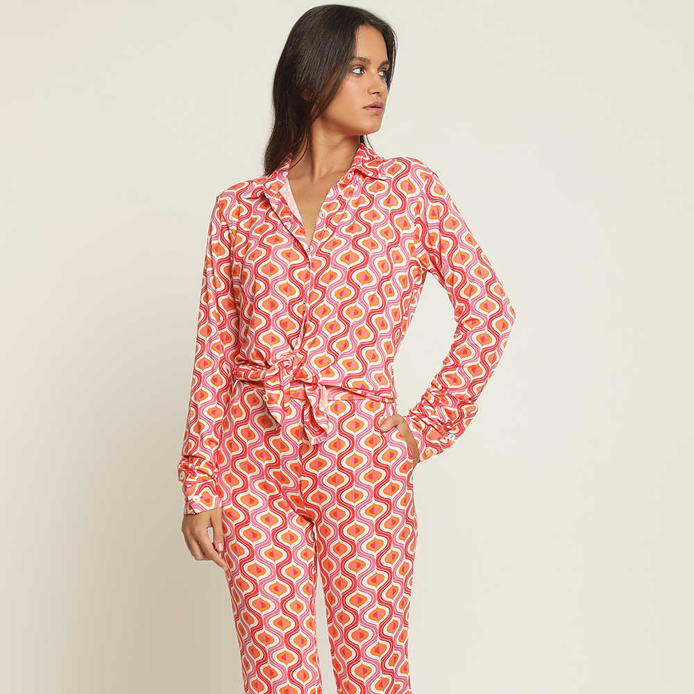 Shop our printed pink jumpsuit from our exclusive summer collection of designer outfits. Shop these wardrobe essentials for women. Shop now!