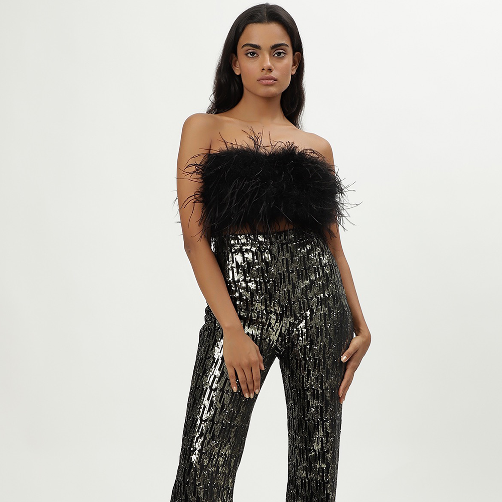 Shop our sequin pants from our collection of designer clothing for party & evening wear for women exclusively at The Luxe Maison. Shop now!