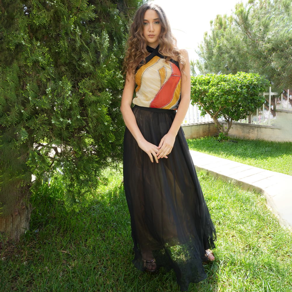 Patchwork Chiffon top with black and gold skirt.