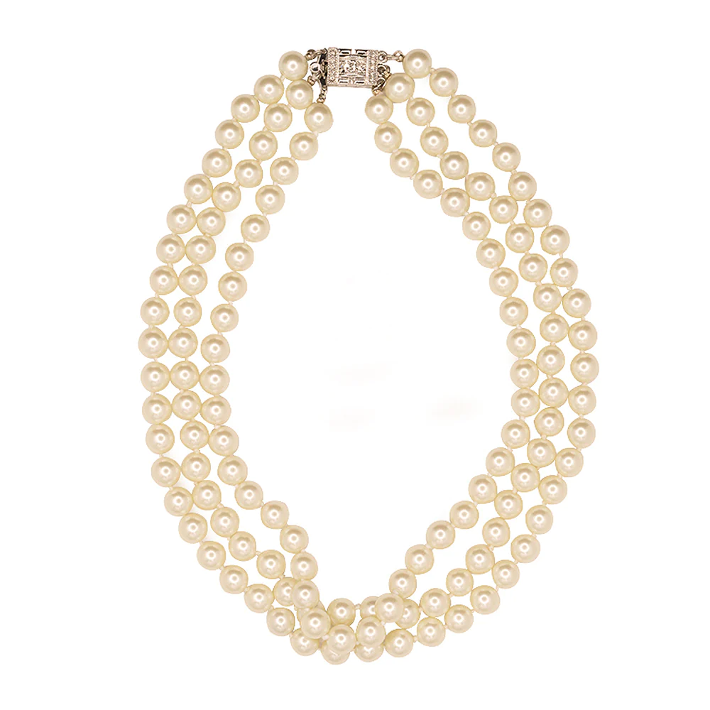 Step into Camelot with this classic white glass pearl necklace worn by Jackie Kennedy Onassis.