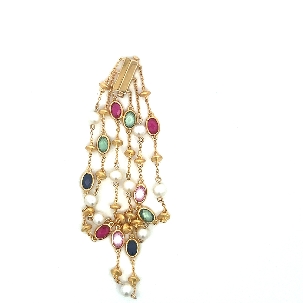 Sterling silver 18k gold-dipped bracelet with freshwater pearls and lab-created ruby, pink, blue, and green sapphire stones for a vibrant modern look. Shop premium jewelry online.