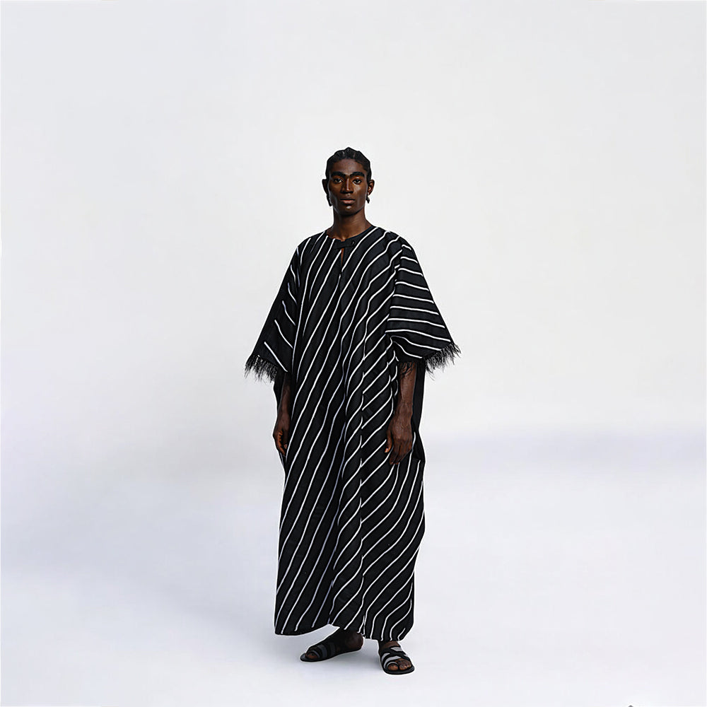 Step into style with the Pele Boubou's sophistication. Shop Now!