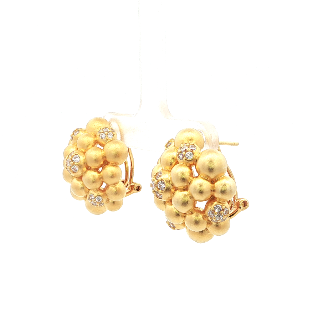 Shop online premium 18K gold earrings with sparkling cubic zirconia accents and elegant design.