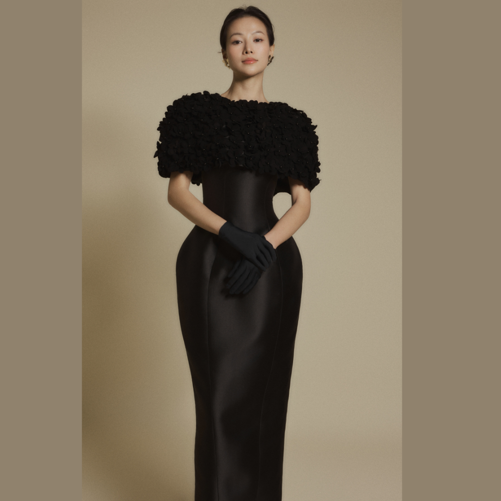Upgrade your wardrobe with women gowns featuring the luxurious Petal Veil Black Gown. Shop Now!
