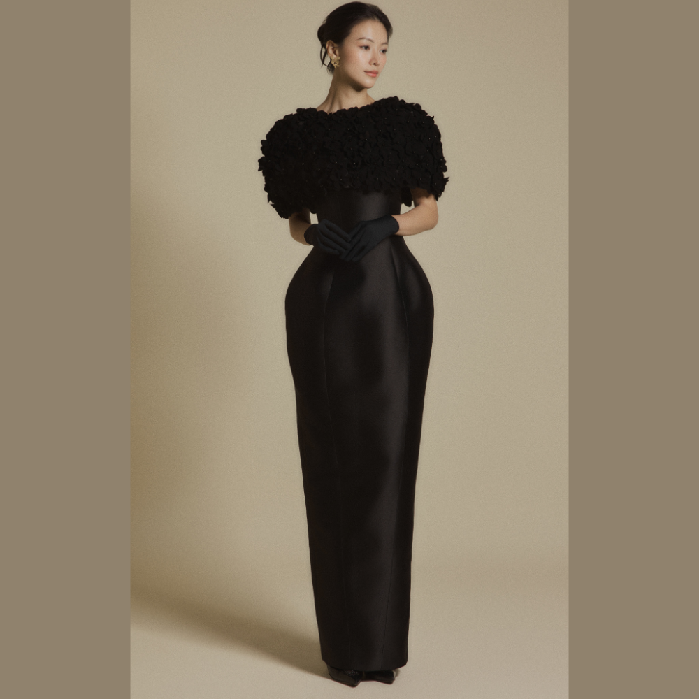 Upgrade your wardrobe with women gowns featuring the luxurious Petal Veil Black Gown. Shop Now!