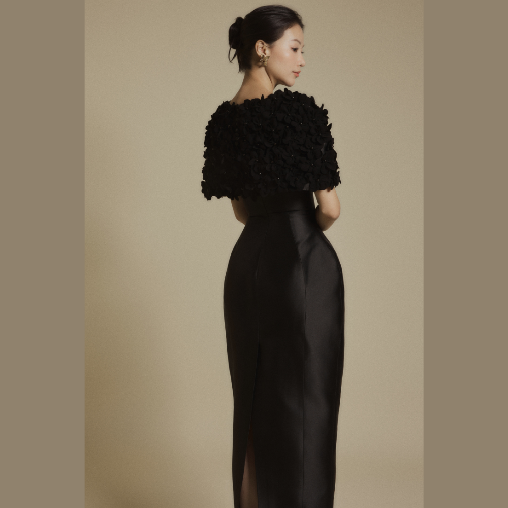 Upgrade your wardrobe with women gowns featuring the luxurious Petal Veil Black Gown. Shop Now!