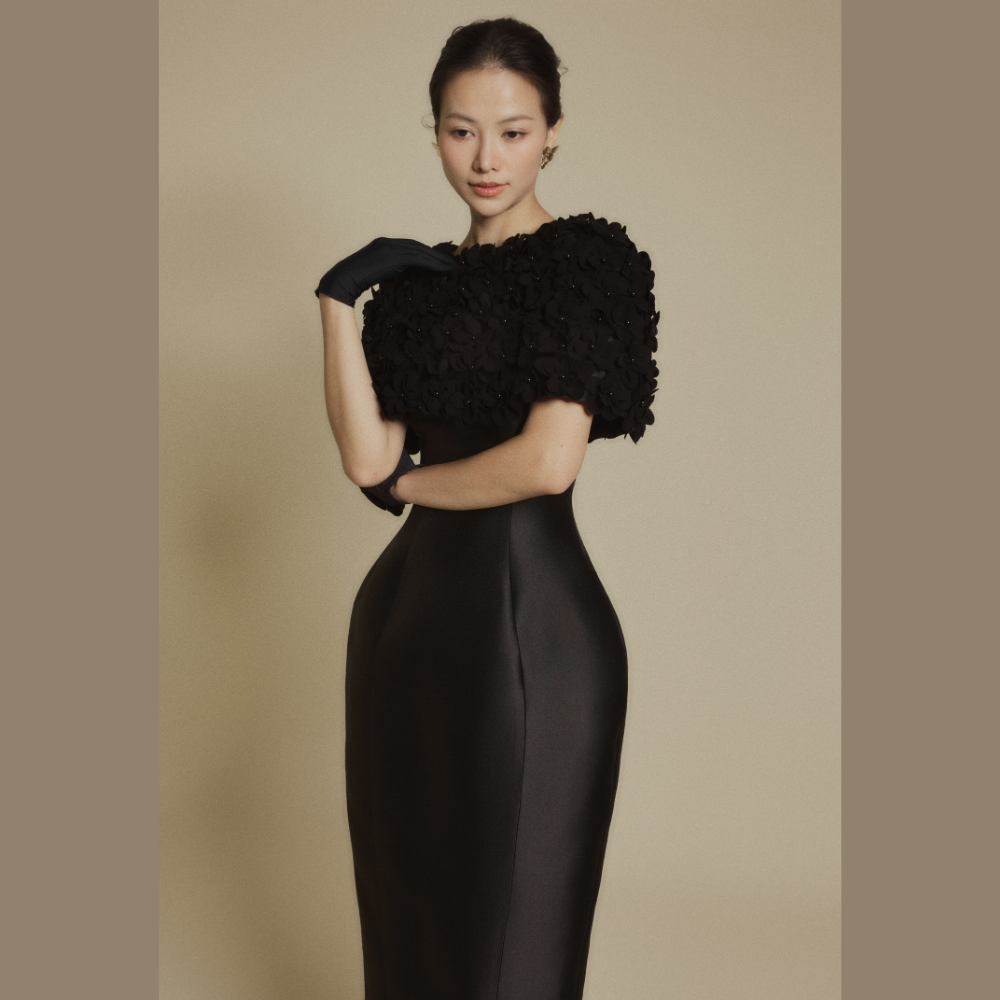 Upgrade your wardrobe with women gowns featuring the luxurious Petal Veil Black Gown. Shop Now!