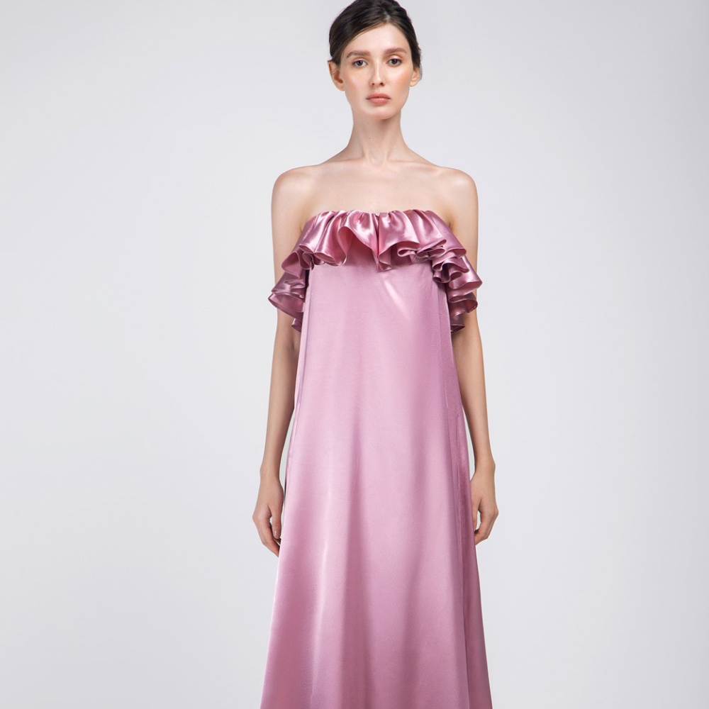 This is a loose long length party wear outfit. A unique ready-to-wear dress. Adorned with a ruffle frill on the chest line.