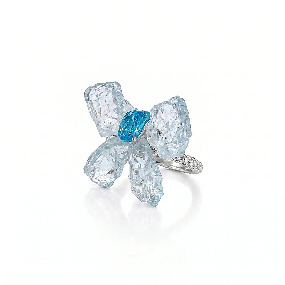 Discover the Psyche Aquamarine & Blue Apatite Butterfly Ring at The Luxe Maison, featuring soft ocean-blue aquamarine wings accented with vibrant blue apatite gemstones. Inspired by the butterfly-winged goddess of the soul, this distinctive ring celebrates transformation and natural beauty with unique gemstone colors and an enchanting butterfly design.