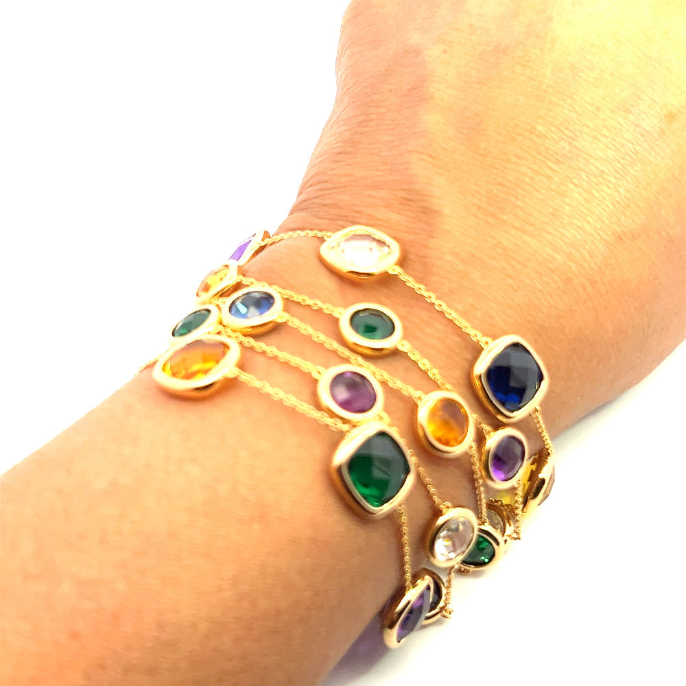 Sterling silver 18k gold-dipped multi-strand bracelet with green nano sital, lab-created amethyst, citrine, blue, and white sapphire stones for a bold layered look. Shop premium jewelry online.