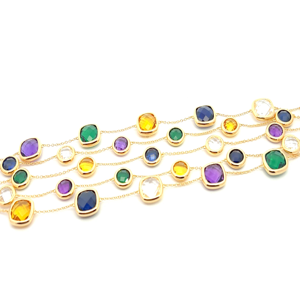 Sterling silver 18k gold-dipped multi-strand bracelet with green nano sital, lab-created amethyst, citrine, blue, and white sapphire stones for a bold layered look. Shop premium jewelry online.