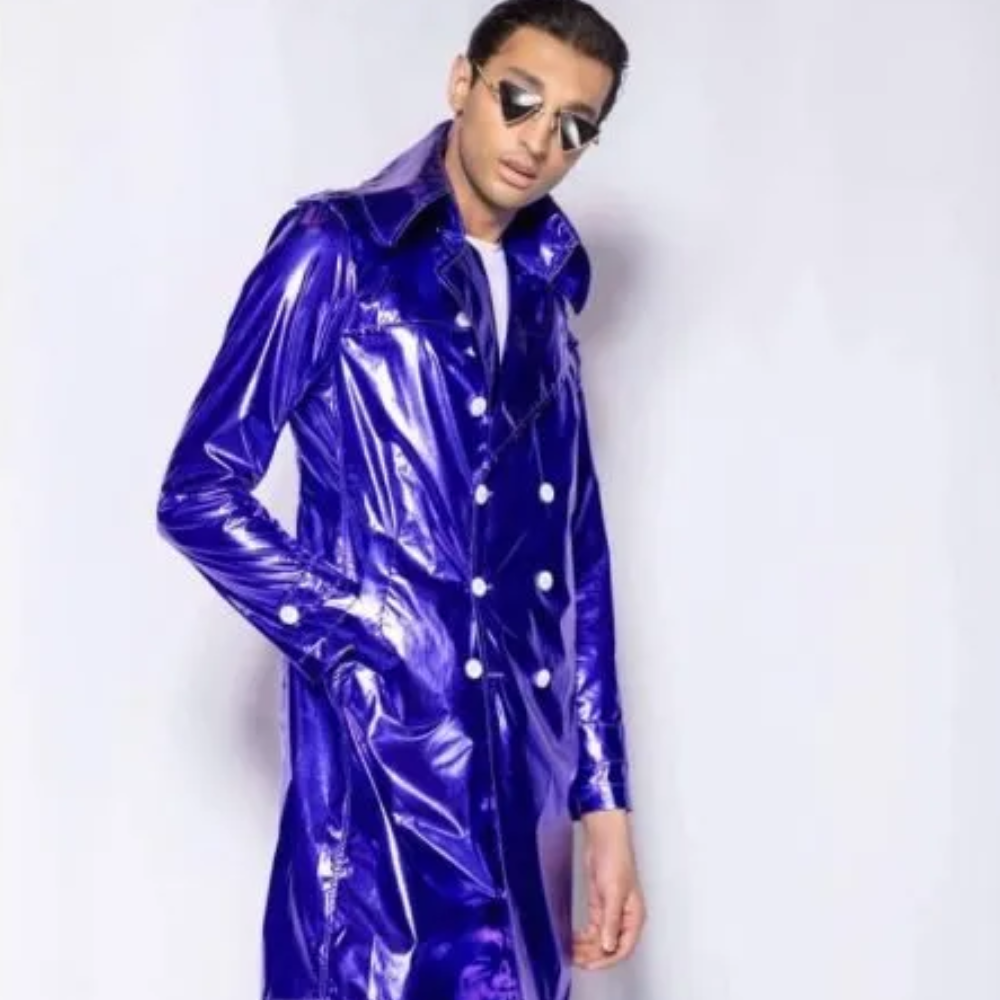 This raincoat is made with imported 100% water-repellant vinyl aluminium fabric with a metallic glossy finish. 