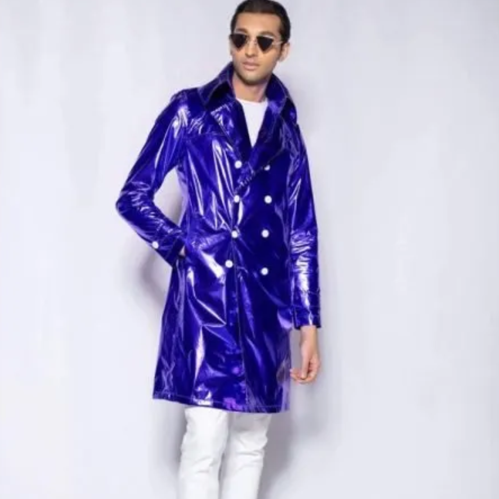 This raincoat is made with imported 100% water-repellant vinyl aluminium fabric with a metallic glossy finish. 
