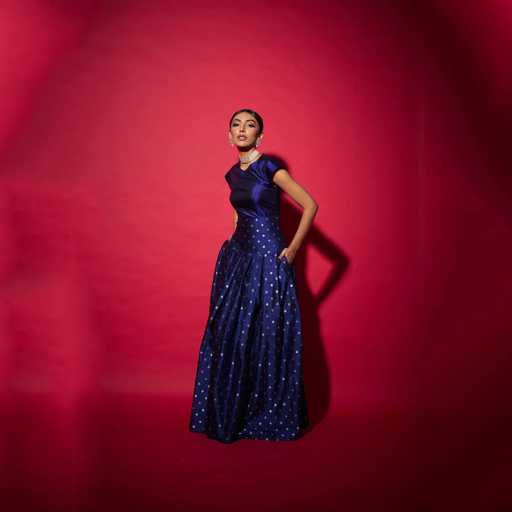 Silk top with brocade skirt, structured festive set for celebrations. Shop online from our curated edit of premium fashion.