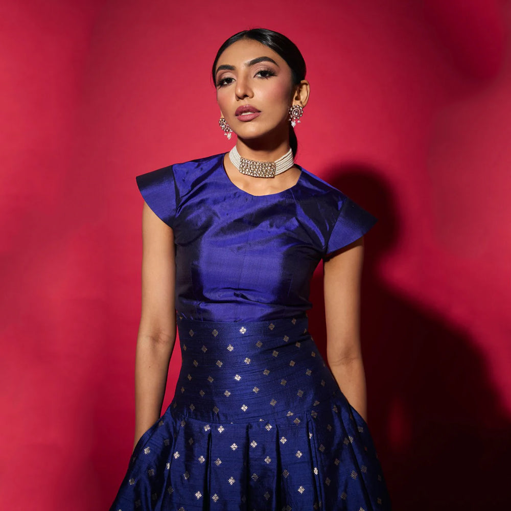 Silk top with brocade skirt, structured festive set for celebrations. Shop online from our curated edit of premium fashion.