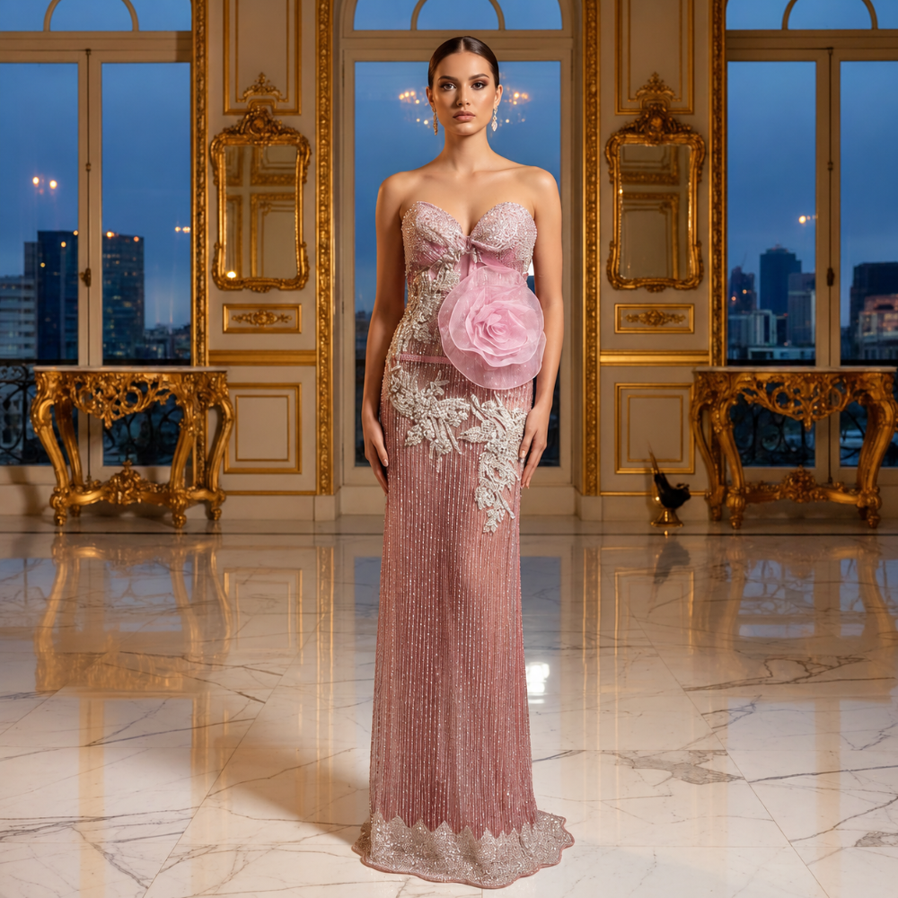Shop online from our exclusive website. Discover the Ray dusty rose evening gown featuring shimmering fabric, a strapless sweetheart neckline, fitted bodice, and flowing floor-length silhouette for galas and special occasions.