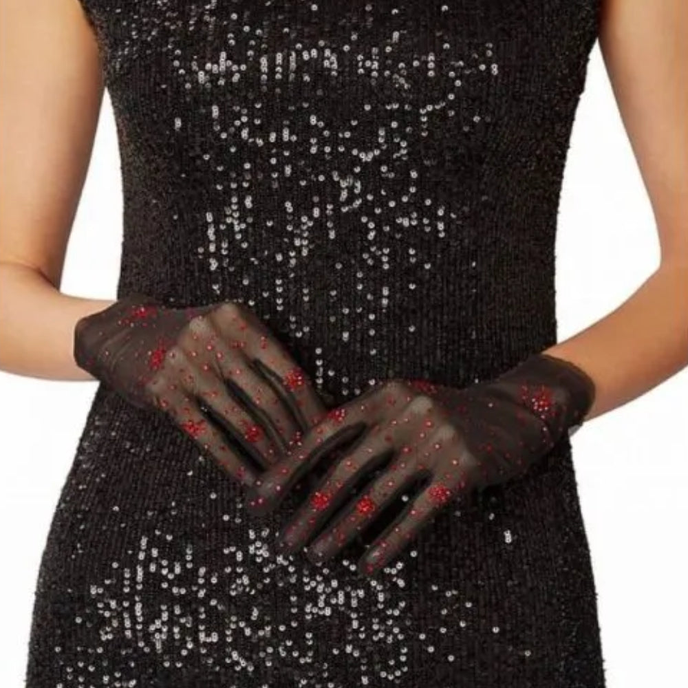 Black gloves from stretch net with salute of scarlet color crystals. The designer is known for their impeccable craftsmanship.