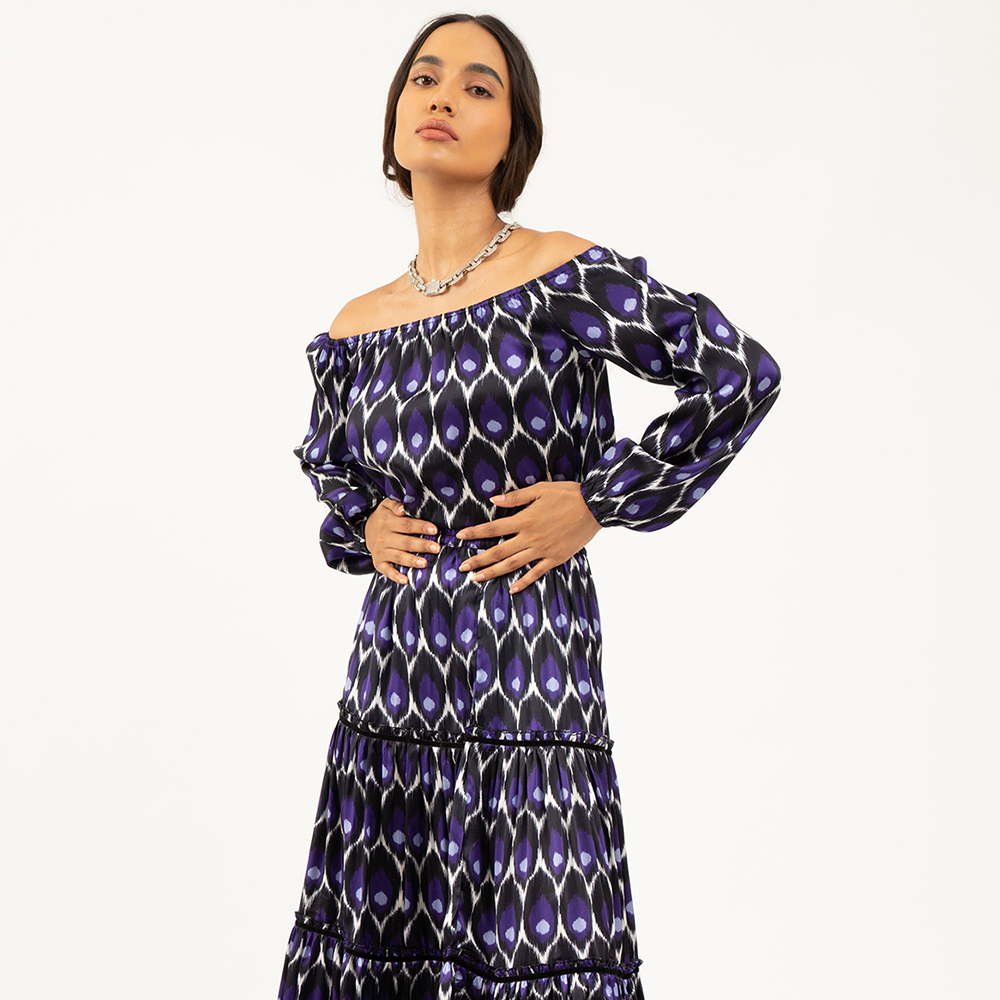 Shop our purple off-shoulder printed dress. Get designer dresses for casual wear for women from our handpicked curation at The Luxe Maison! Shop now!
