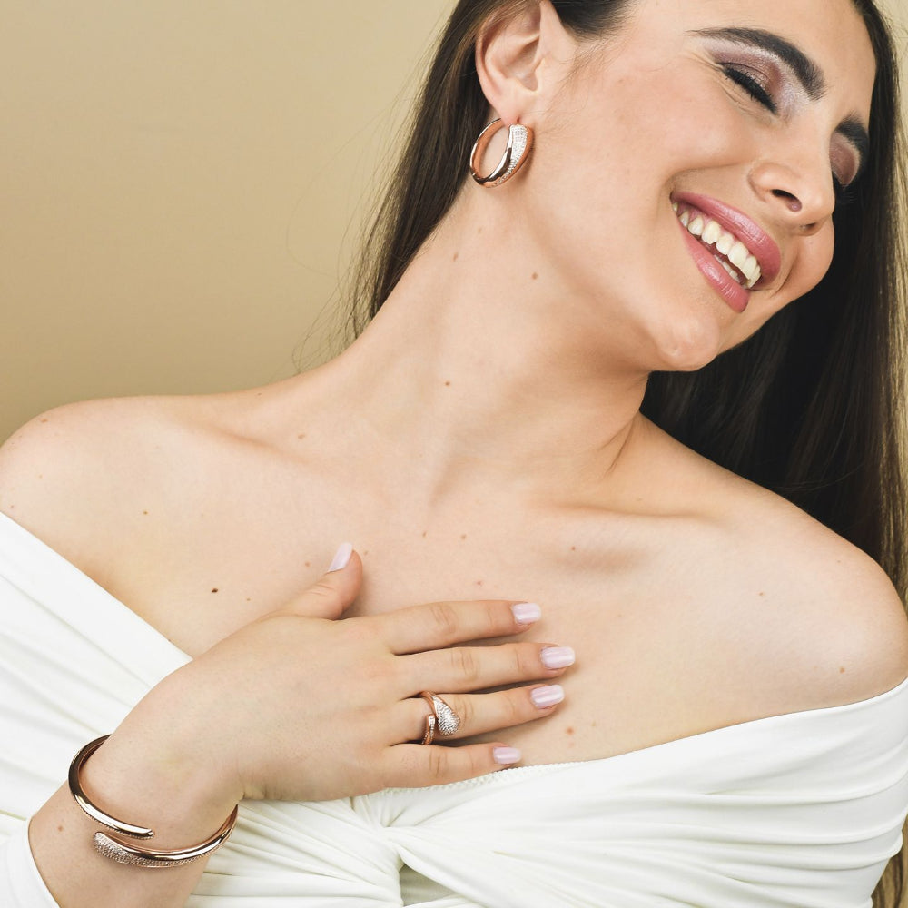 Shop online premium rose gold plated oval hoop earrings with sparkling pavé cubic zirconia detailing for elegant everyday styling.