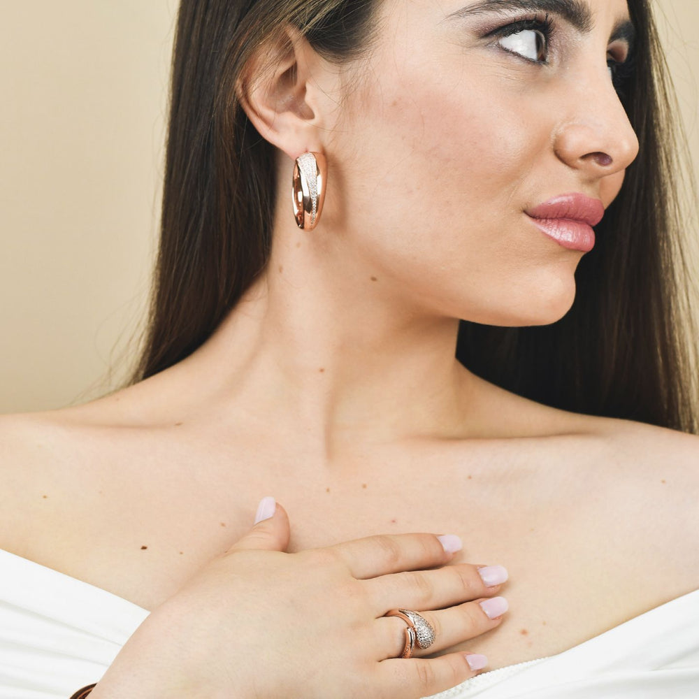Shop online premium rose gold plated oval hoop earrings with sparkling pavé cubic zirconia detailing for elegant everyday styling.