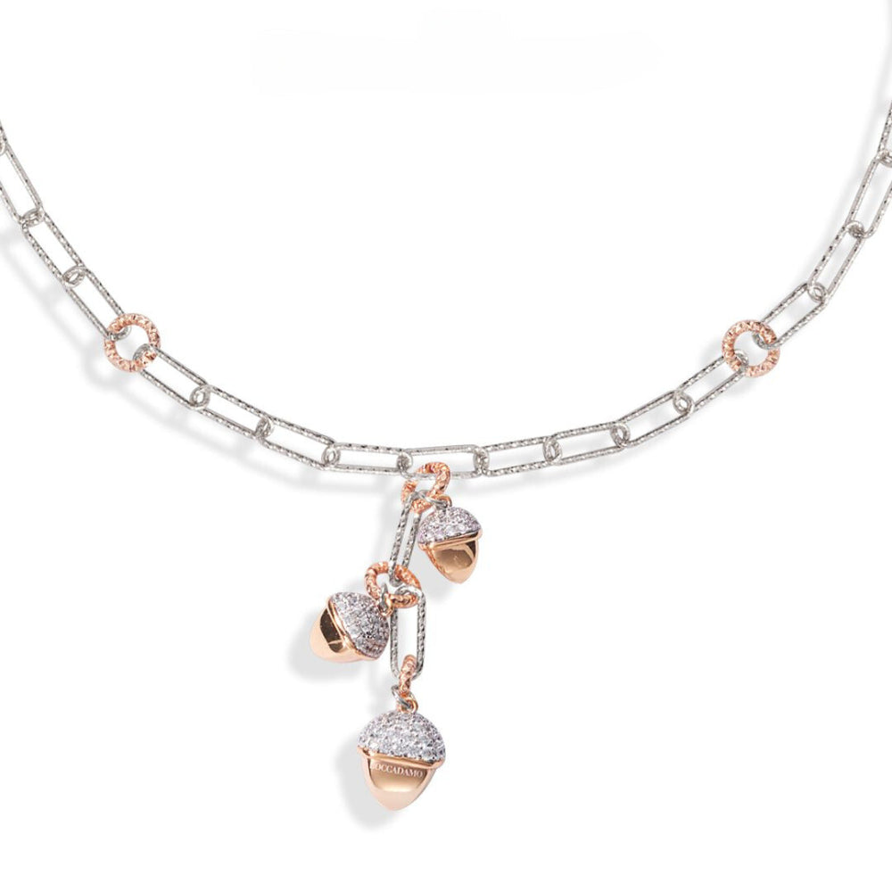 Shop online premium rhodium and rose gold plated necklace with pyramid pendants and sparkling cubic zirconia accents.