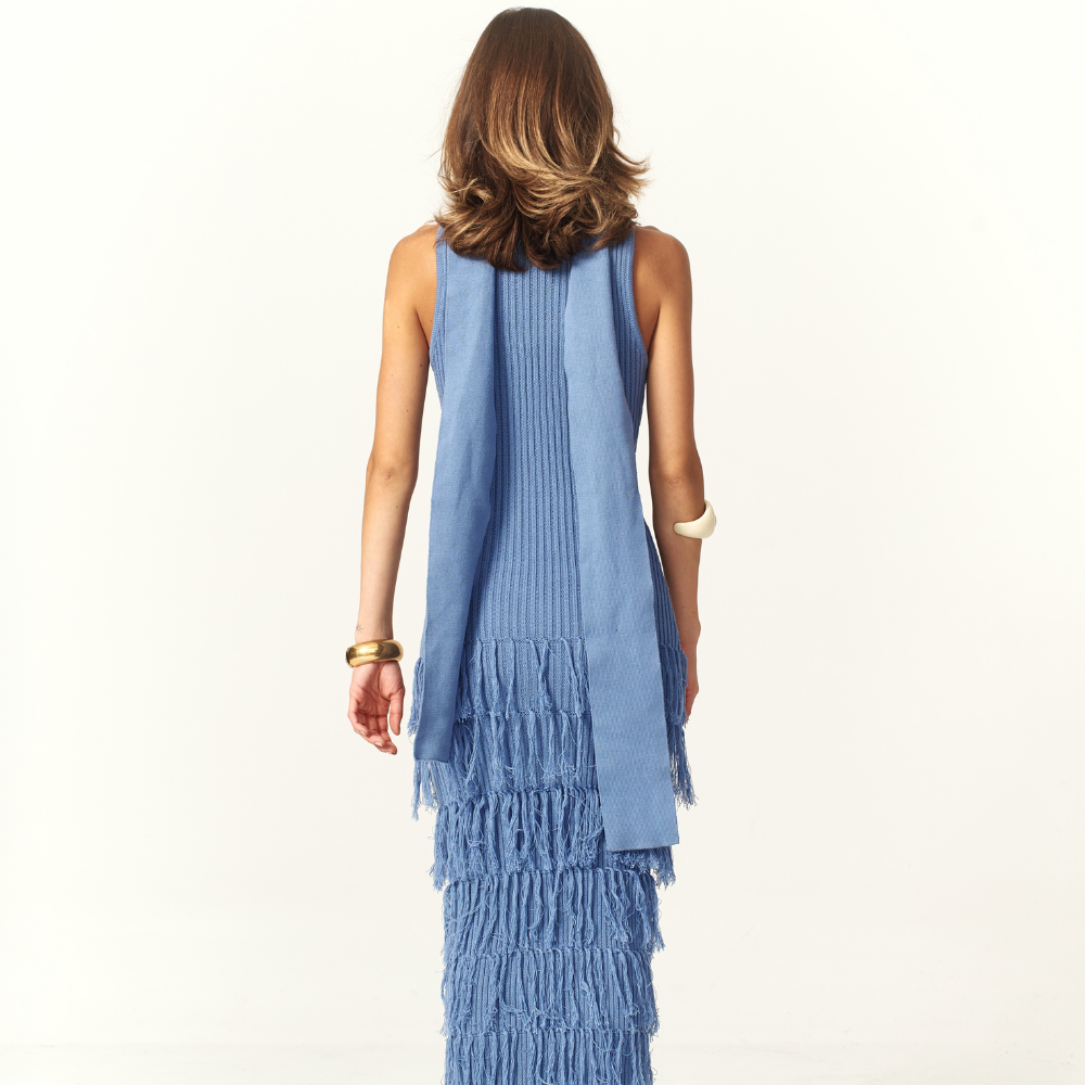 Shop the Rosy Steel Blue Maxi Dress at TLM, featuring a fitted ribbed silhouette and layered fringe. Explore luxury fashion on The Luxe Maison website.