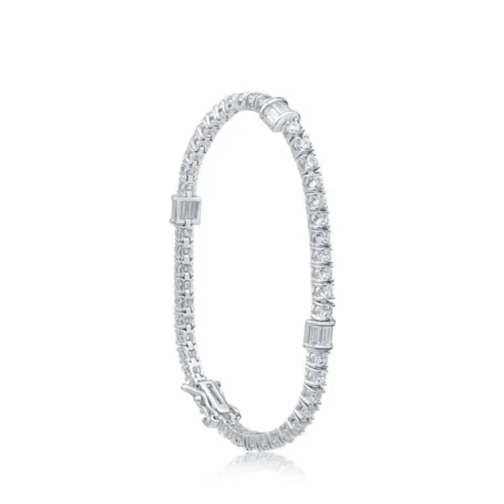 4 CTTW Pave Cubic Zirconia alternating link chain bracelet. Lobster clasp closure. Set in 18k gold plated brass.