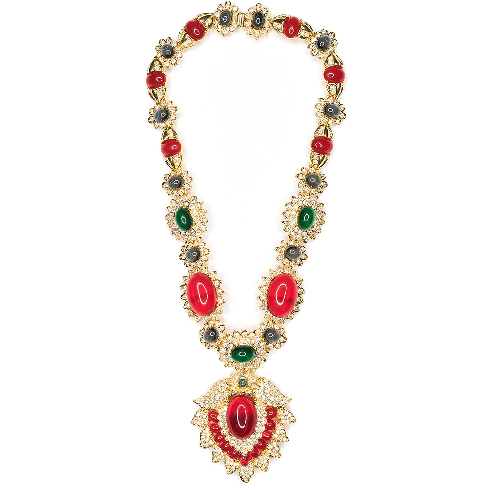 Channel your inner Jackie Kennedy with this ruby, emerald and sapphire stone pendant necklace.