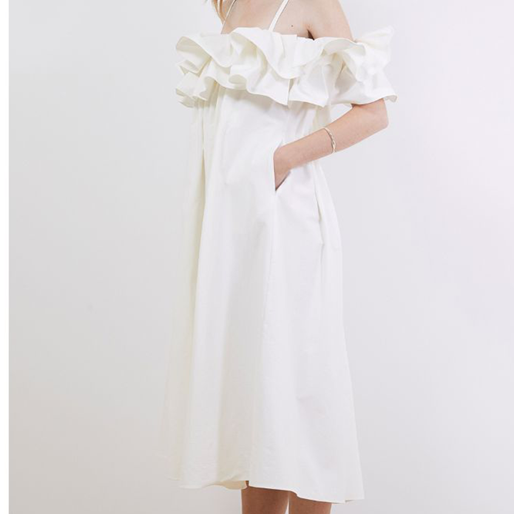 Raw-edged, Round neckline One side handkerchief-hem with patch pocket Adjustable tie belt at waist relaxed silhouette.