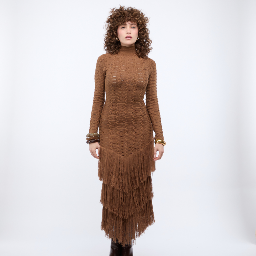Shop the Rumi Long Sleeve Maxi Dress at TLM, featuring tie-up straps and layered fringe detailing. Explore luxury fashion on The Luxe Maison website.