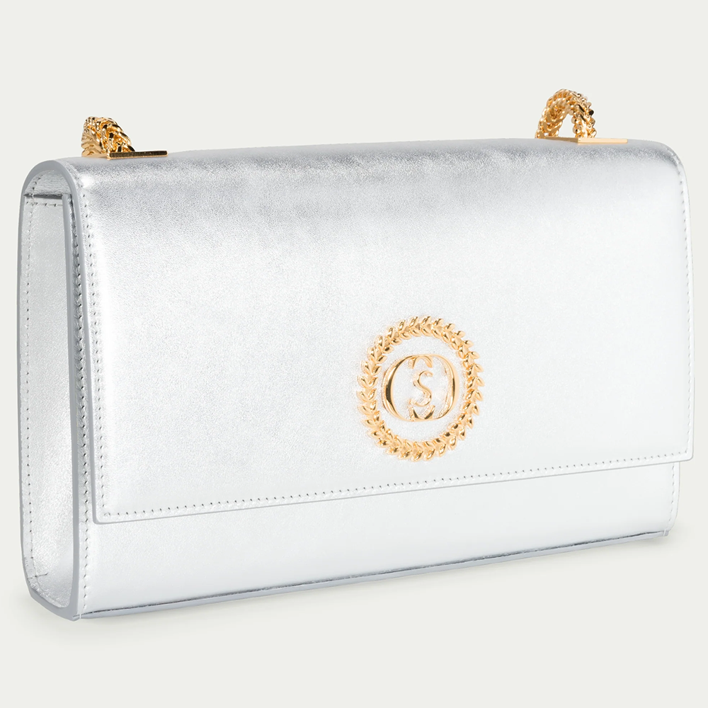 This velvet bag is hand-finished in Italy with gold plated hardware.