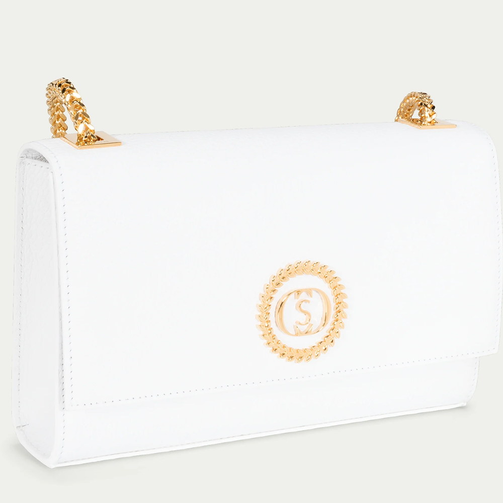 This velvet bag is hand-finished in Italy with gold plated hardware.