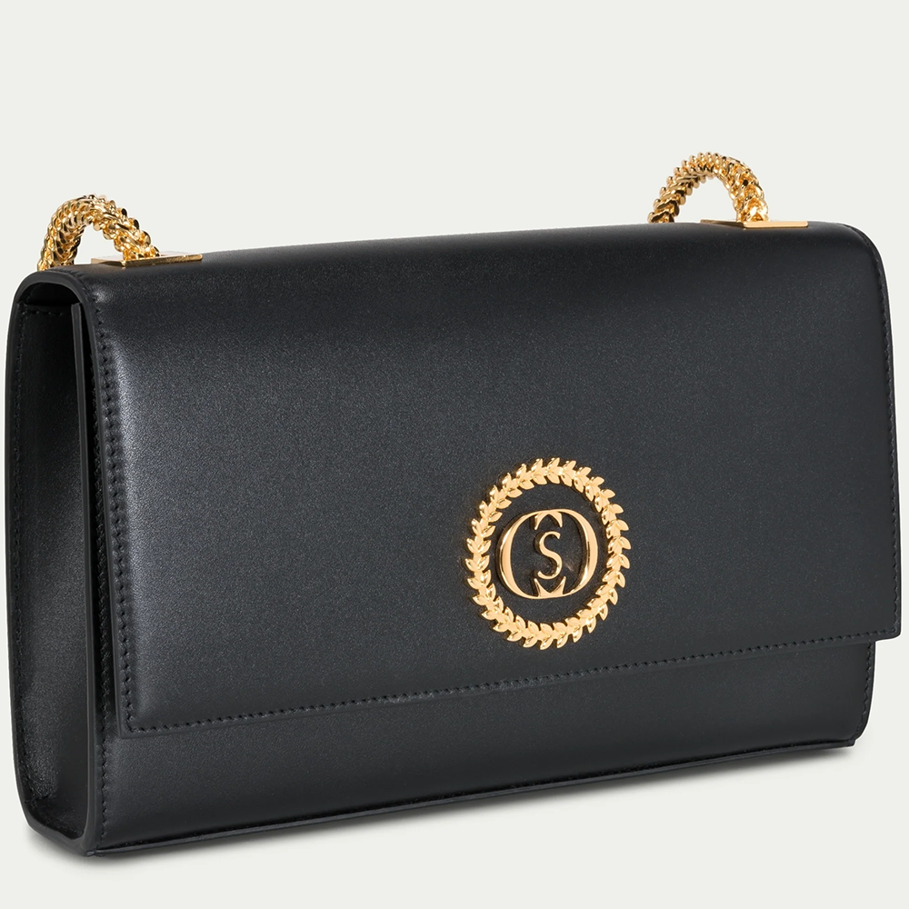 This velvet bag is hand-finished in Italy with gold plated hardware.