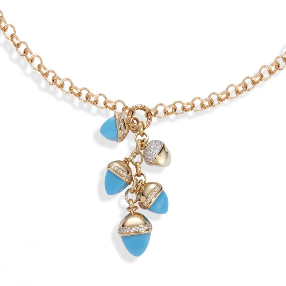 Shop online premium gold plated necklace with turquoise pyramidal crystals and sparkling cubic zirconia accents.