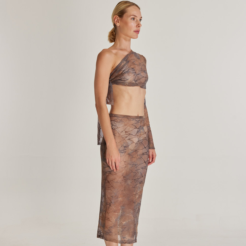 Introducing our proudly presented Sand Serpent ensemble, consisting of a high-waisted pencil skirt and a one-shoulder tied bustier.