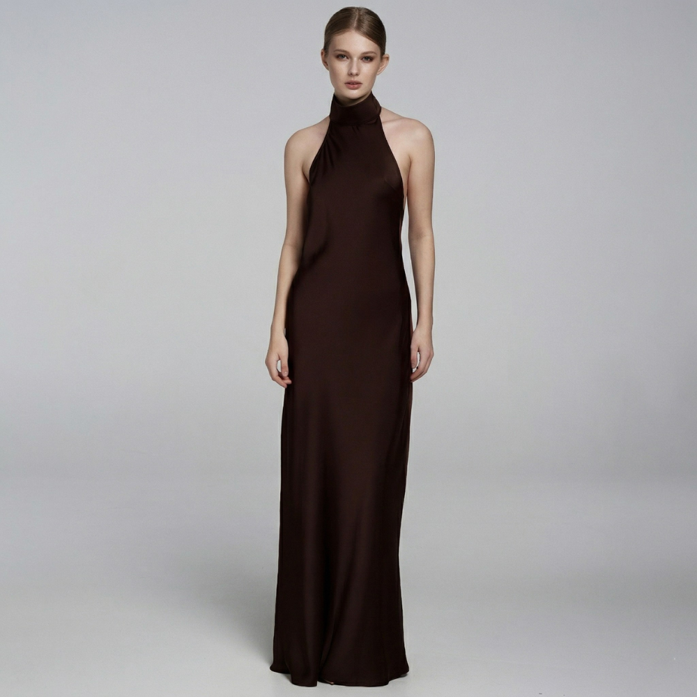 Elegant floor-length dress with a stunning open back for a graceful, timeless look. Shop now at our exclusive clothing website.