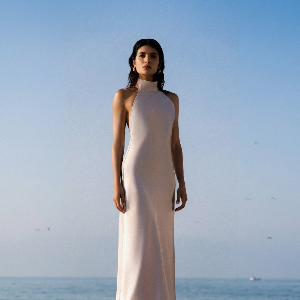 Elegant floor-length dress with a stunning open back for a graceful, timeless look. Shop now at our exclusive clothing website.