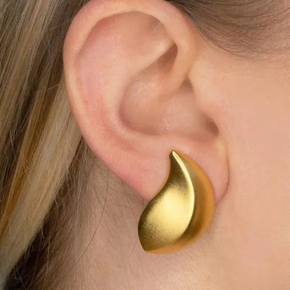 Gleaming satin gold leaf shaped earrings make it easy to add a dreamy touch to any outfit.