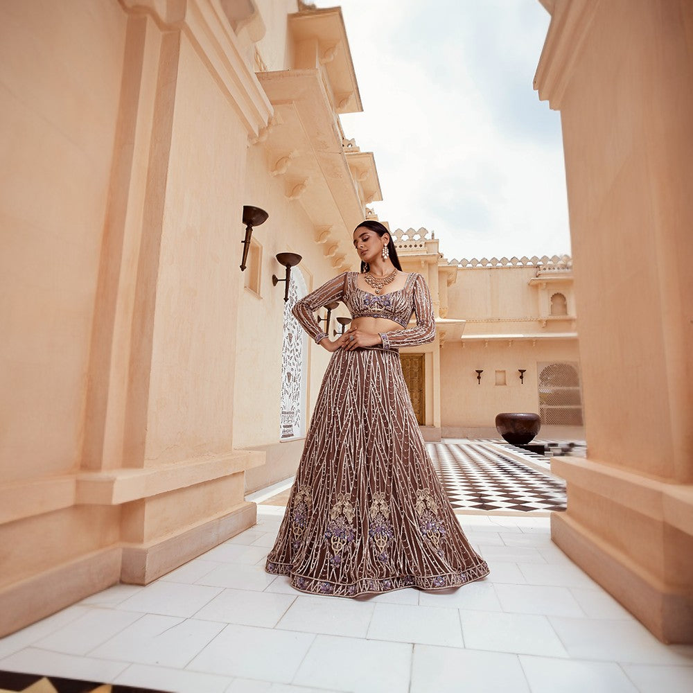 Scintilla rings of the cosmos juxtaposed with bouquet of flowers over blouse and lehenga.