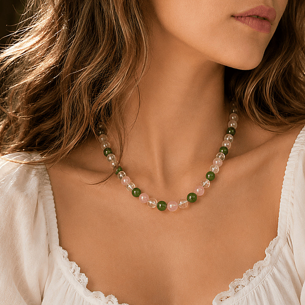 Discover the Secret Garden Rose Quartz & Crystal Beaded Necklace at The Luxe Maison, featuring clear quartz, Madagascar rose quartz, and vibrant green jadeite-inspired beads for a fresh, colorful, nature-inspired look.