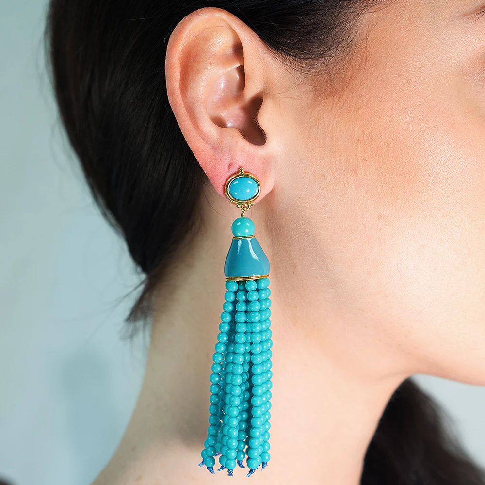 Beaded tassels make these lightweight drop earrings a fresh, fun addition to your retro-chic style.