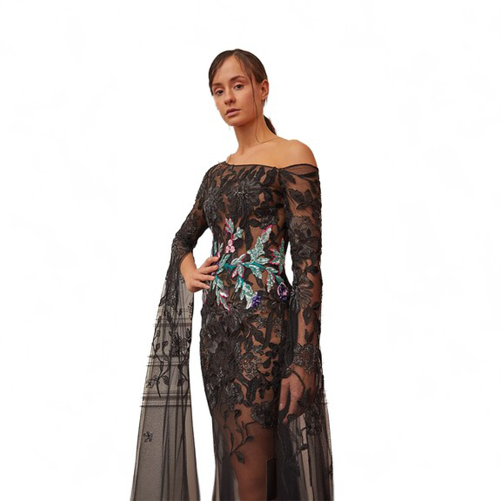 Slanting shoulder style with elongated sleeves with the embroidered net bodice. 