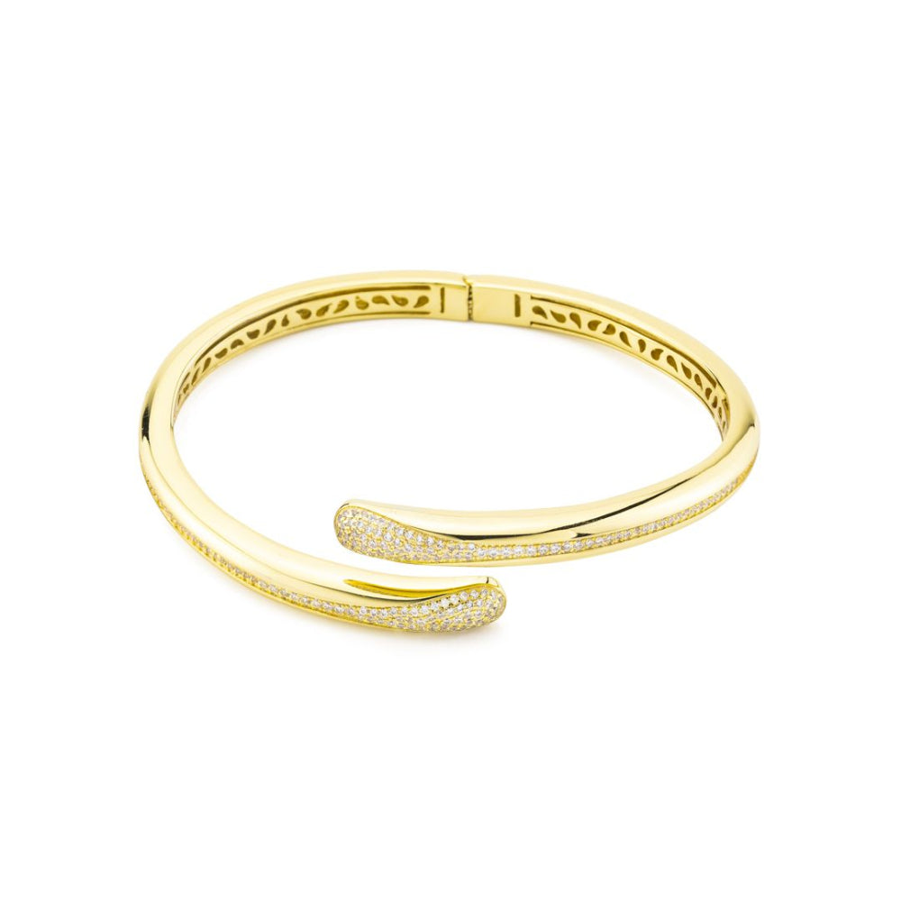 Elegant gold plated bronze wrap cuff bracelet adorned with sparkling pavé cubic zirconia stones for a timeless luxe look. Shop premium jewelry online.