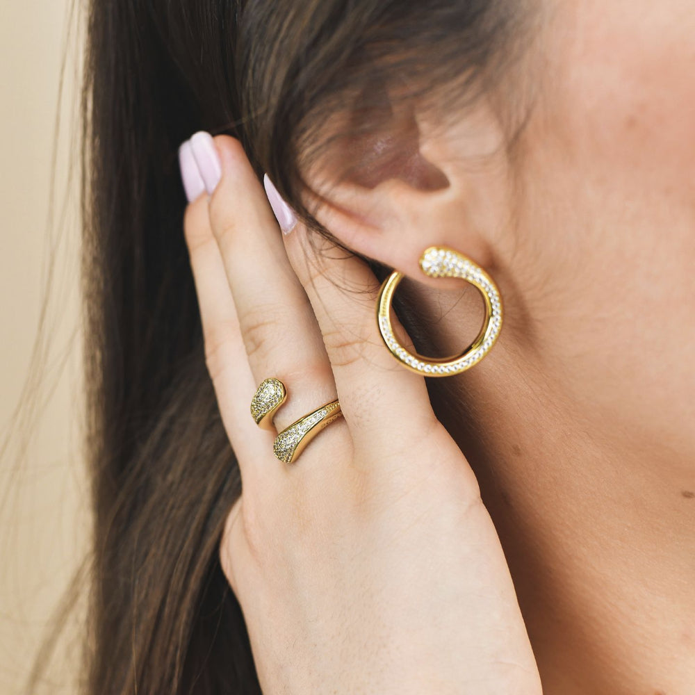 Shop online premium yellow gold plated wrap cuff ring with sparkling pave cubic zirconia stones.