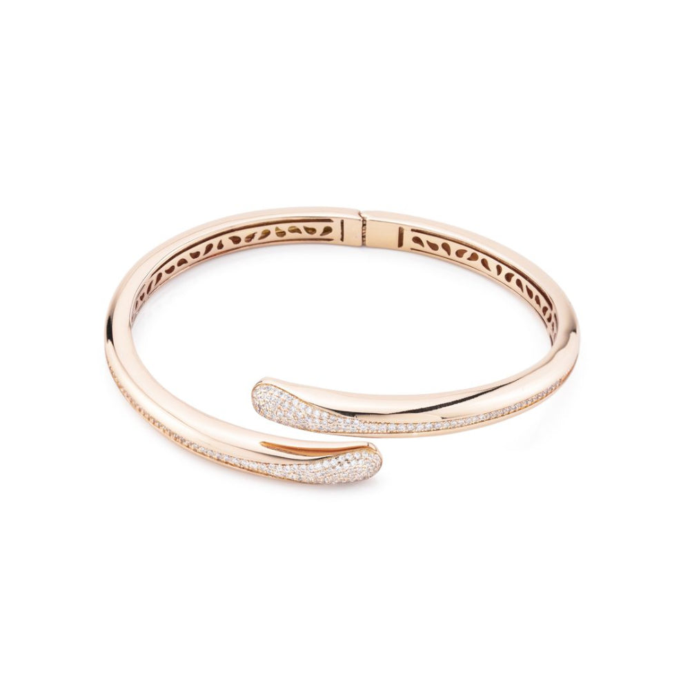 Elegant rose gold plated wrap cuff bracelet adorned with sparkling pavé cubic zirconia stones for a chic luxe statement. Shop premium jewelry online.