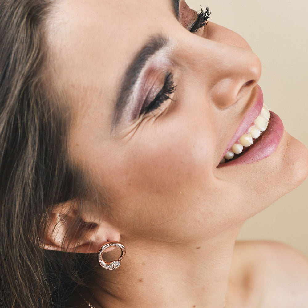 Shop online premium rose gold plated wrap earrings with drop-shaped pavé cubic zirconia detailing for elegant modern styling.